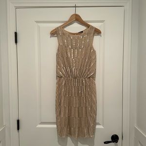 Mid length sequin dress, perfect for a cocktail party or as a wedding guest!